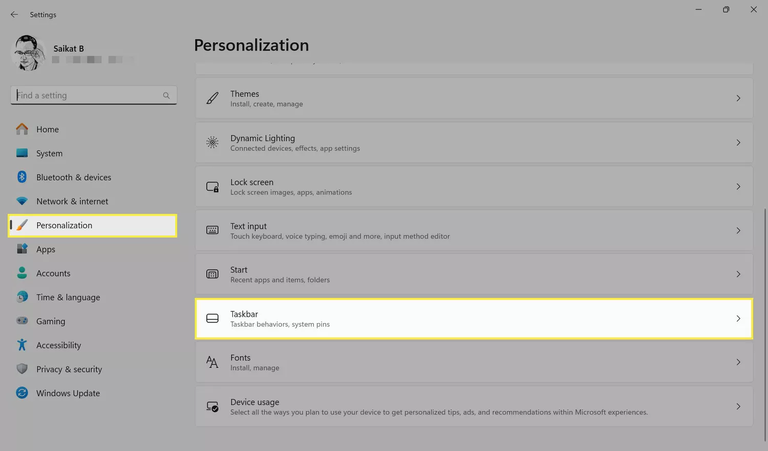 The Personalization menu in Windows 11 settings with the Taskbar section highlighted