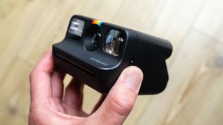 Polaroid Go 2 being held to show the small size